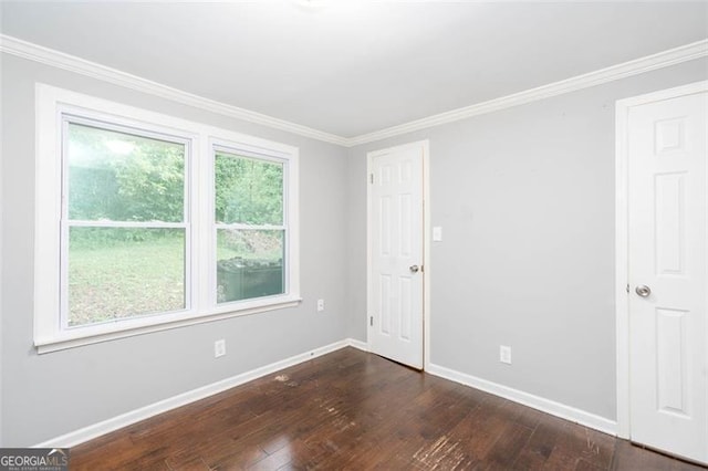 2607 Jefferson Ter, Atlanta, GA 30344 - unfurnished room featuring dark wood finished floors and crown molding