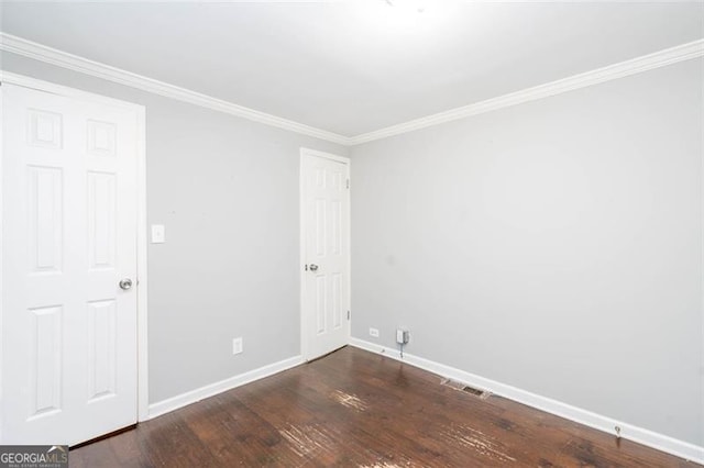 2607 Jefferson Ter, Atlanta, GA 30344 - empty room featuring dark wood-style flooring and ornamental molding