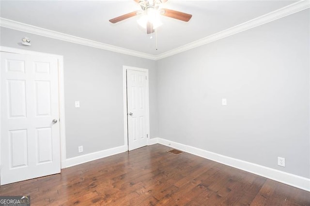 2607 Jefferson Ter, Atlanta, GA 30344 - unfurnished room with crown molding, dark wood-type flooring, and a ceiling fan
