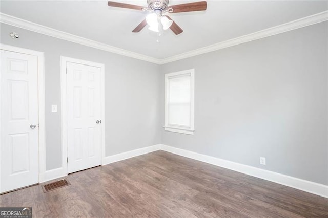 2607 Jefferson Ter, Atlanta, GA 30344 - empty room with wood finished floors, ceiling fan, and ornamental molding