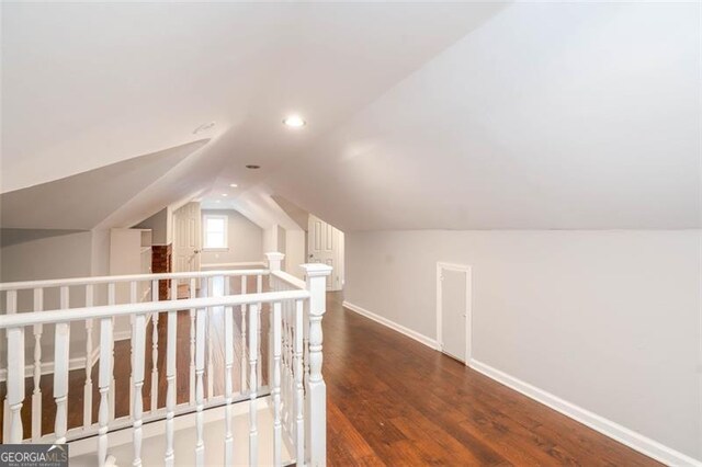 2607 Jefferson Ter, Atlanta, GA 30344 - additional living space featuring vaulted ceiling, wood finished floors, and recessed lighting