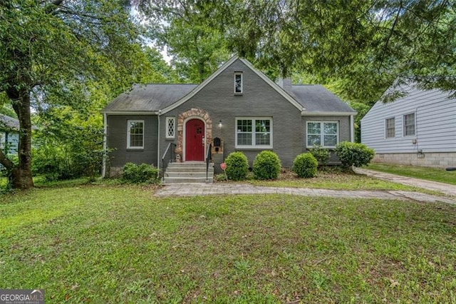2607 Jefferson Ter, Atlanta, GA 30344 - view of front of house with a front lawn and a chimney