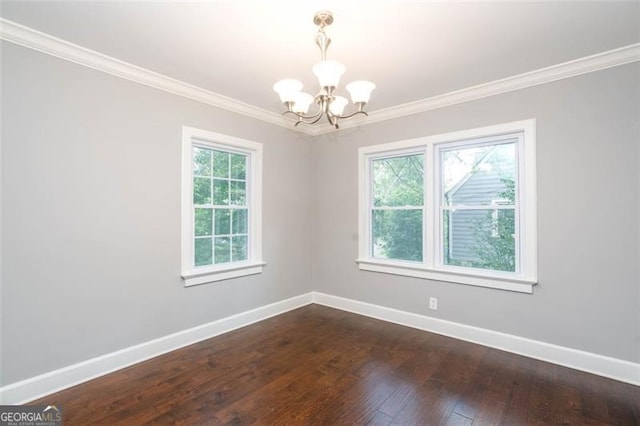 2607 Jefferson Ter, Atlanta, GA 30344 - unfurnished room featuring a chandelier, ornamental molding, and dark wood-style flooring