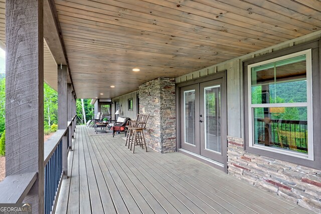 wooden terrace with french doors