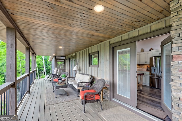 deck featuring covered porch
