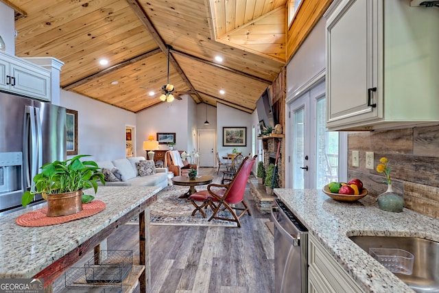 kitchen with wood ceiling, dark wood-type flooring, appliances with stainless steel finishes, ceiling fan, and light stone countertops