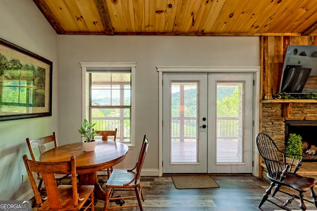 doorway to outside with french doors, wooden ceiling, wood finished floors, and baseboards