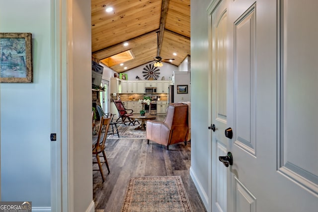 foyer entrance featuring dark wood-type flooring, ceiling fan, recessed lighting, wood ceiling, and baseboards