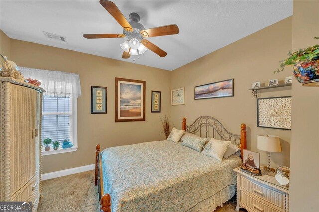 404 Hunts Landing Dr, Kathleen, GA 31047 - bedroom with baseboards, a ceiling fan, carpet flooring, and visible vents