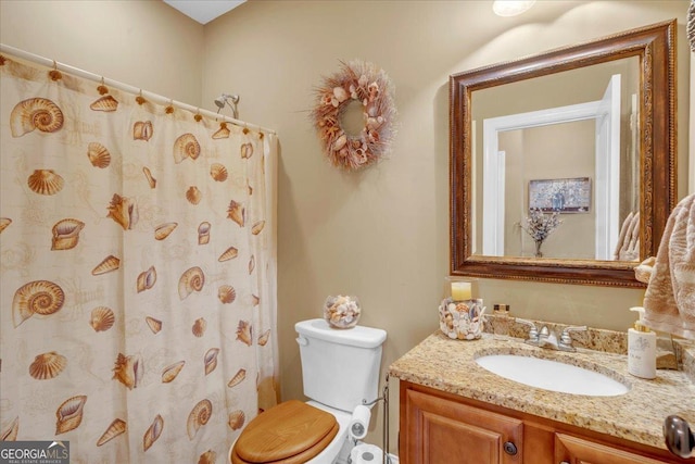 404 Hunts Landing Dr, Kathleen, GA 31047 - bathroom with vanity, a shower with shower curtain, and toilet