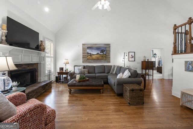 112 Pebblebrooke Run, Canton, GA 30115 - living area featuring high vaulted ceiling, ceiling fan, a stone fireplace, and wood finished floors