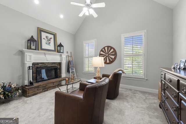 112 Pebblebrooke Run, Canton, GA 30115 - living room with ceiling fan, light colored carpet, a stone fireplace, and baseboards