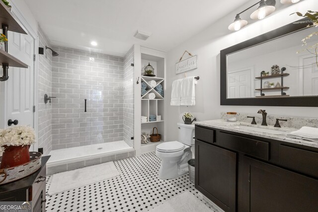112 Pebblebrooke Run, Canton, GA 30115 - bathroom with vanity, a stall shower, and toilet