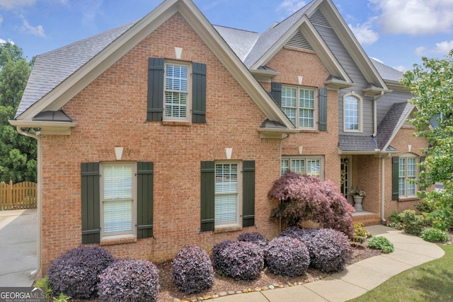 3641 Carriage Glen Way, Dacula, GA 30019 - view of front facade with brick siding and a shingled roof