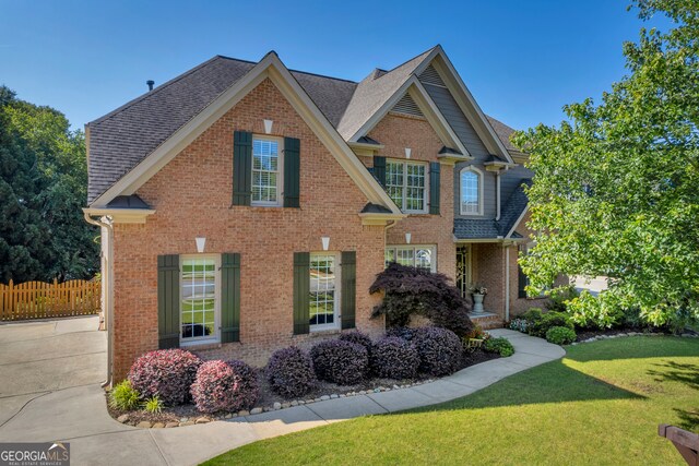 3641 Carriage Glen Way, Dacula, GA 30019 - view of front of home featuring brick siding and roof with shingles