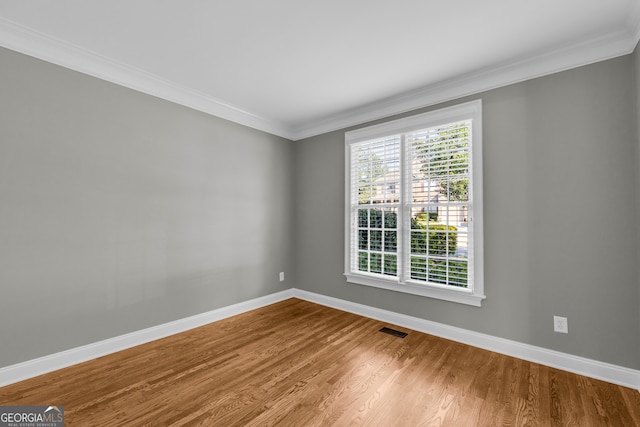 3641 Carriage Glen Way, Dacula, GA 30019 - empty room with baseboards, wood finished floors, and crown molding