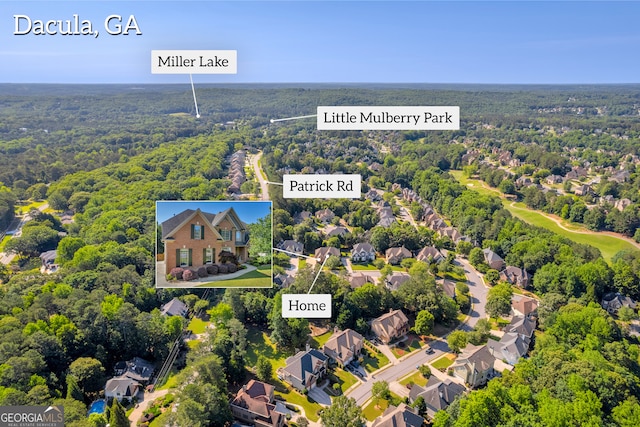 3641 Carriage Glen Way, Dacula, GA 30019 - aerial perspective of suburban area featuring a forest