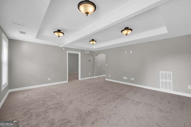 3641 Carriage Glen Way, Dacula, GA 30019 - carpeted empty room with a raised ceiling, arched walkways, and healthy amount of natural light