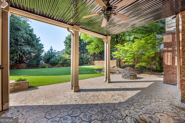 3641 Carriage Glen Way, Dacula, GA 30019 - view of patio with ceiling fan and an outdoor fire pit