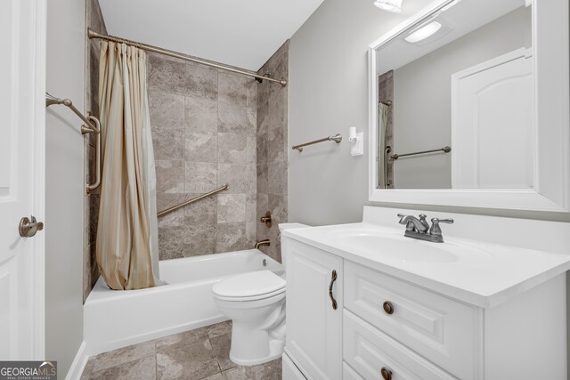 3641 Carriage Glen Way, Dacula, GA 30019 - bathroom featuring vanity, shower / bath combo with shower curtain, and toilet
