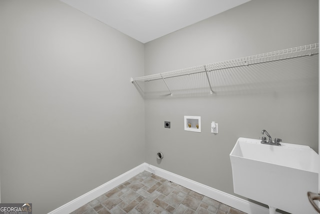3641 Carriage Glen Way, Dacula, GA 30019 - laundry area with baseboards, electric dryer hookup, washer hookup, and stone finish floors