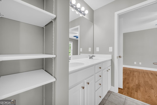 3641 Carriage Glen Way, Dacula, GA 30019 - bathroom with double vanity, tile patterned flooring, and baseboards