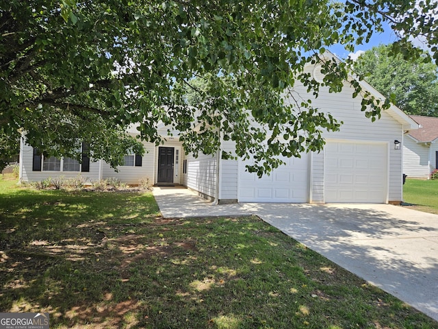 obstructed view of property featuring driveway, a front yard, and a garage