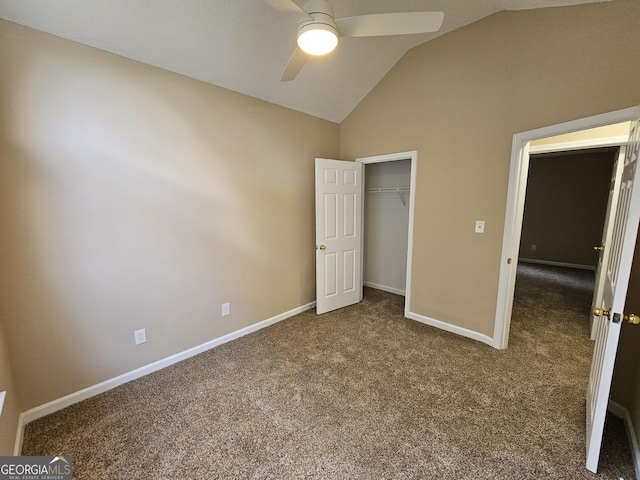 unfurnished bedroom with ceiling fan, baseboards, high vaulted ceiling, a closet, and carpet flooring