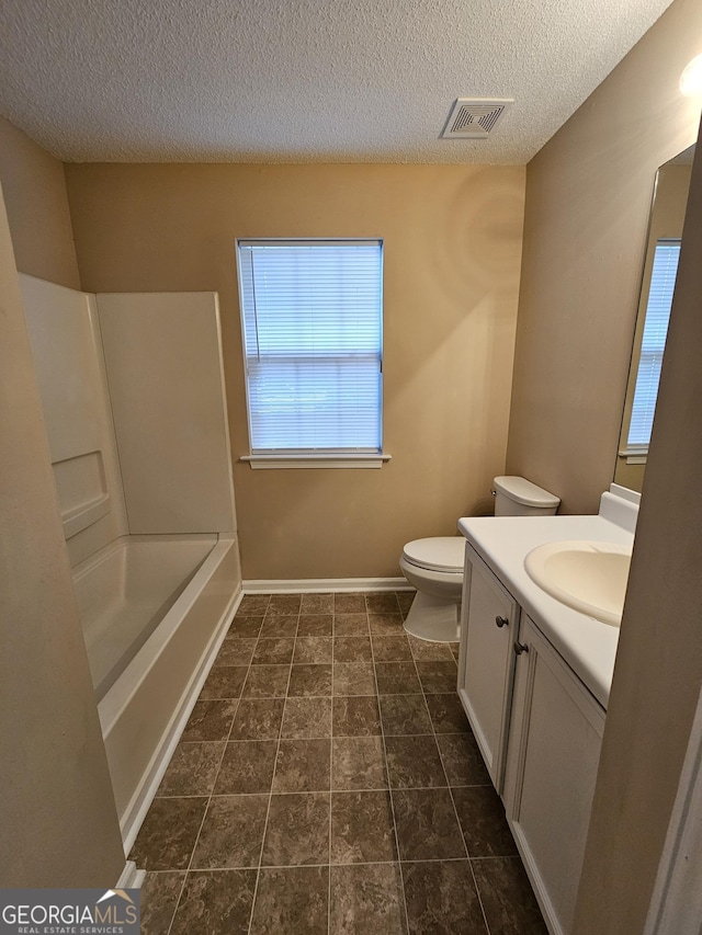 full bathroom with visible vents, a textured ceiling, toilet, and vanity