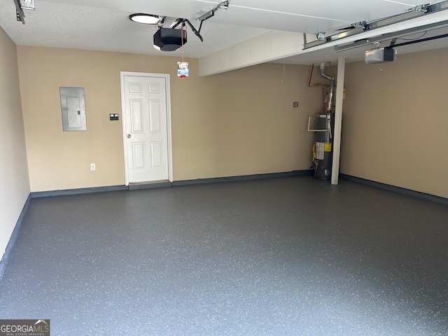 3081 Regal Dr, Mcdonough, GA 30253 - garage featuring baseboards, water heater, electric panel, and a garage door opener