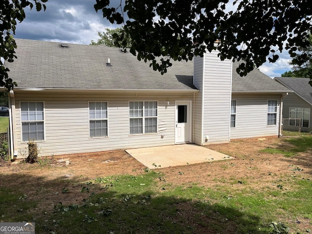 3081 Regal Dr, Mcdonough, GA 30253 - rear view of property with roof with shingles, a patio, and a lawn