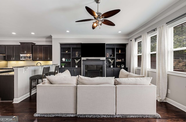 5934 Norfolk Chase Rd, Peachtree Corners, GA 30092 - living room with dark wood-style flooring, ornamental molding, a ceiling fan, and recessed lighting