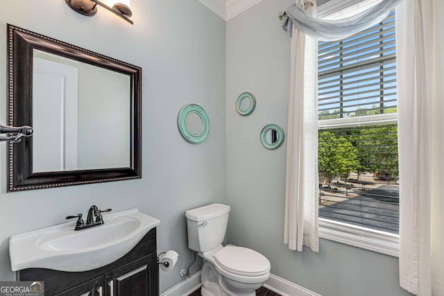 5934 Norfolk Chase Rd, Peachtree Corners, GA 30092 - bathroom featuring toilet, baseboards, vanity, and ornamental molding