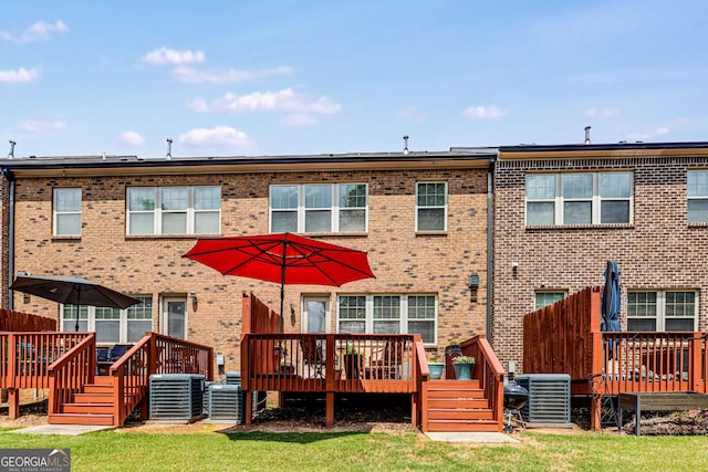 5934 Norfolk Chase Rd, Peachtree Corners, GA 30092 - back of house with central AC unit, brick siding, and a wooden deck