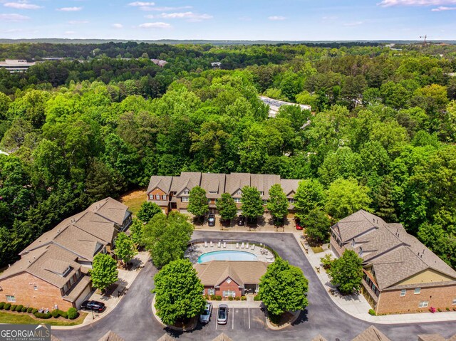 5934 Norfolk Chase Rd, Peachtree Corners, GA 30092 - bird's eye view featuring a wooded view
