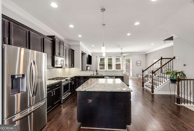 5934 Norfolk Chase Rd, Peachtree Corners, GA 30092 - kitchen featuring tasteful backsplash, recessed lighting, a center island, light stone countertops, and appliances with stainless steel finishes