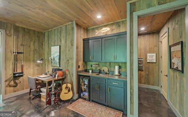 bar featuring concrete flooring, wood walls, wooden ceiling, indoor wet bar, and wine cooler