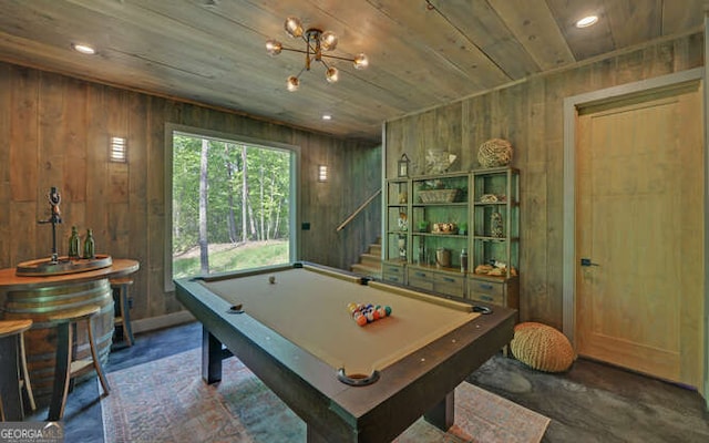 game room with wood walls, pool table, and wooden ceiling