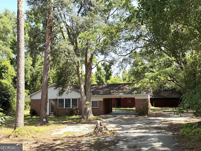 4365 US Highway 341, Jesup, GA 31545 - single story home with driveway, brick siding, and a carport