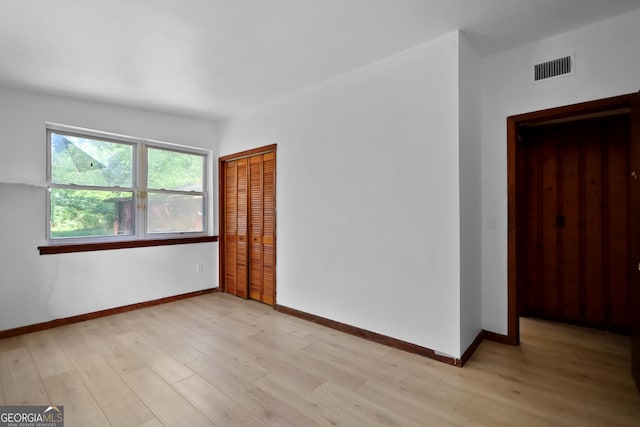 4365 US Highway 341, Jesup, GA 31545 - empty room with light wood-style floors and baseboards