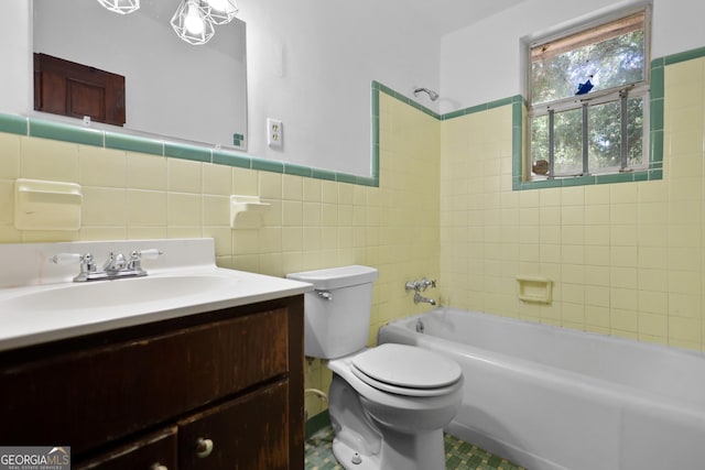 4365 US Highway 341, Jesup, GA 31545 - bathroom featuring tile walls, shower / washtub combination, vanity, toilet, and tile patterned floors