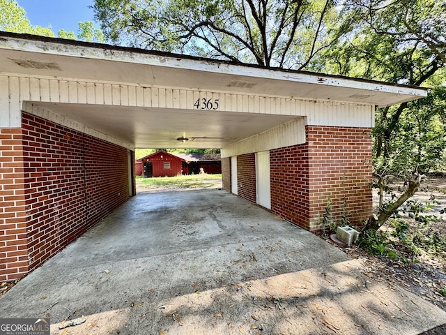 4365 US Highway 341, Jesup, GA 31545 - view of vehicle parking featuring a carport and a storage unit