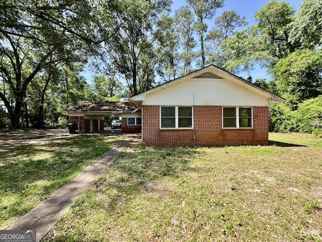 4365 US Highway 341, Jesup, GA 31545 - view of front of property with a front lawn and brick siding