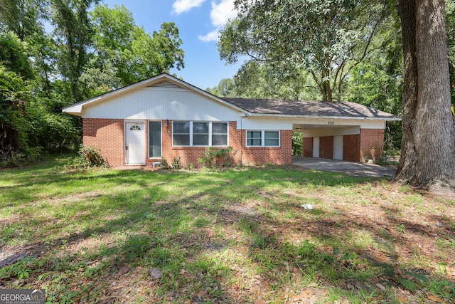 4365 US Highway 341, Jesup, GA 31545 - single story home with brick siding, a front lawn, and an attached carport