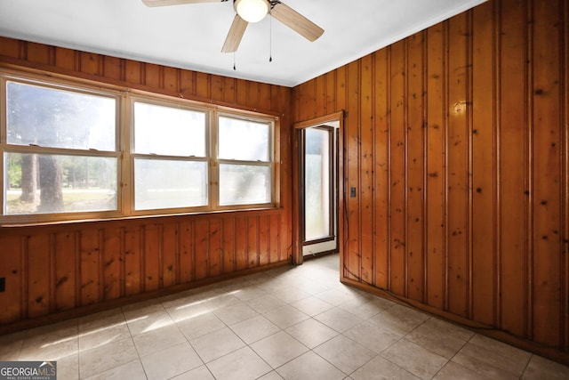 4365 US Highway 341, Jesup, GA 31545 - empty room with wood walls, a ceiling fan, and crown molding