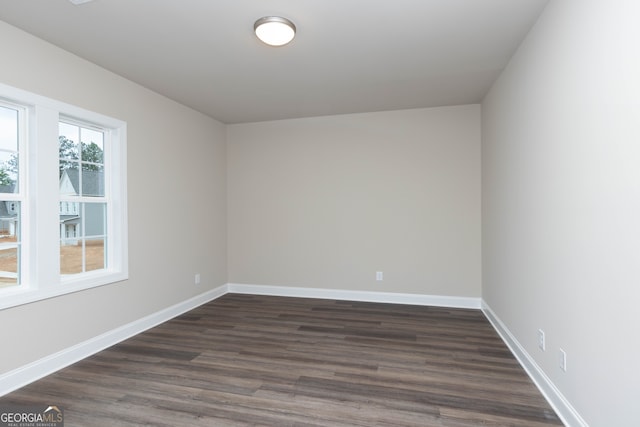 5587 Spring St, Flowery Branch, GA 30542 - spare room with dark wood finished floors