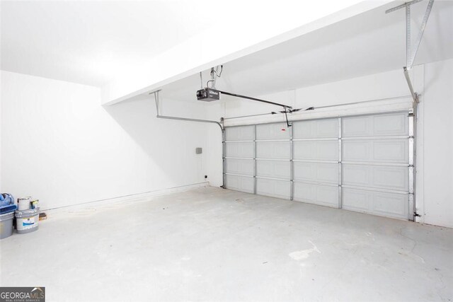 3314 Dilmus Dr, Powder Springs, GA 30127 - garage with a garage door opener