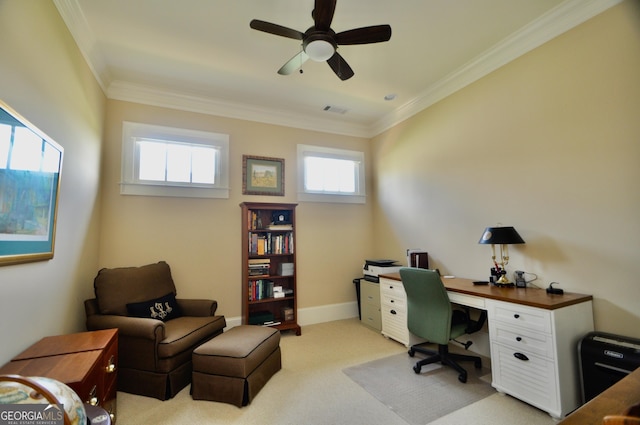 office with crown molding, ceiling fan, light carpet, baseboards, and visible vents