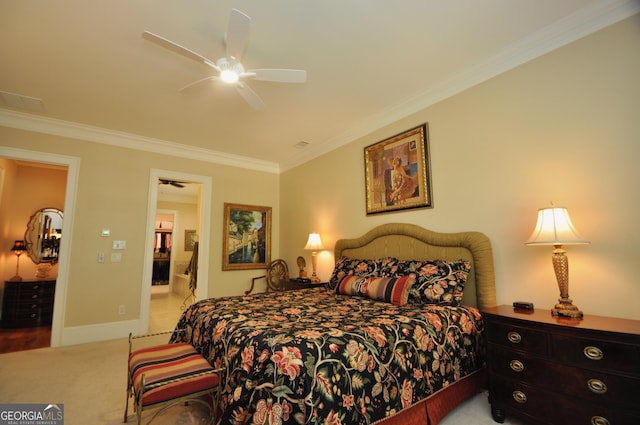 bedroom with baseboards, ornamental molding, carpet, and ceiling fan