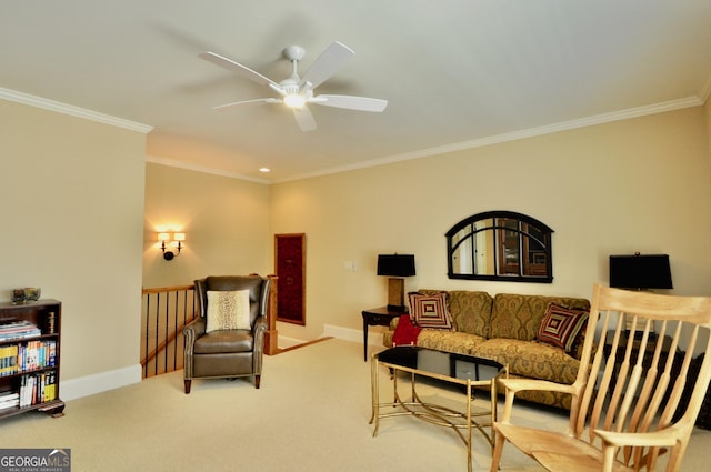 carpeted living room featuring crown molding, baseboards, and ceiling fan